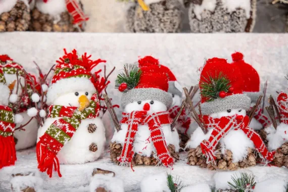 white snowman with red and green christmas baubles