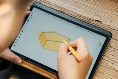 a person holding a tablet